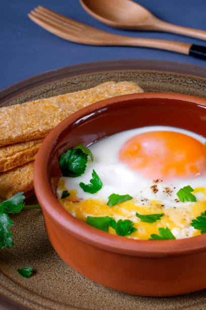 istock Egg casserole with cheese in the ceramic portion bowl 1285132680