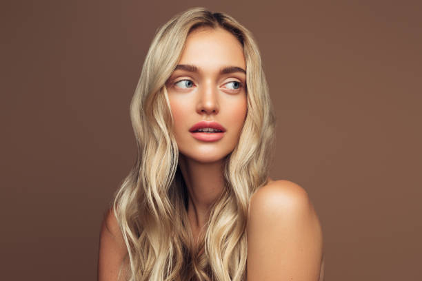 istock Beautiful and excited blond woman 1285134162