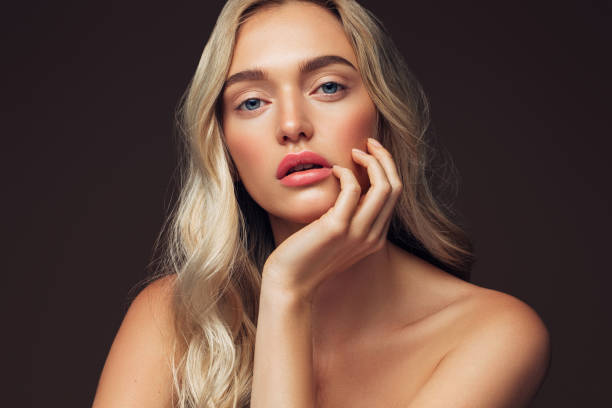 istock Beautiful woman with light make-up 1285134402