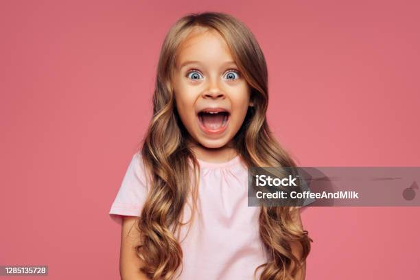 Funny Girl On Pink Background Stock Photo - Download Image Now - Child, Happiness, Surprise
