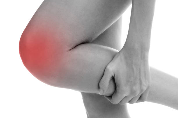 istock Pain in leg. Isolated on white background 1285138615