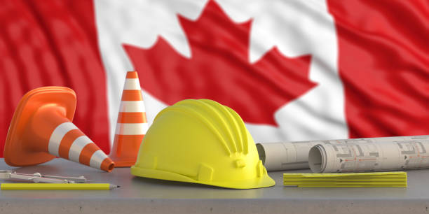 istock Hardhat and safety equipment on Canada flag background, 3d illustration 1285139876