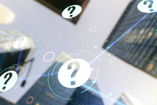 istock Abstract virtual question mark illustration on office buildings background. FAQ and search concept. Multiexposure 1285140188