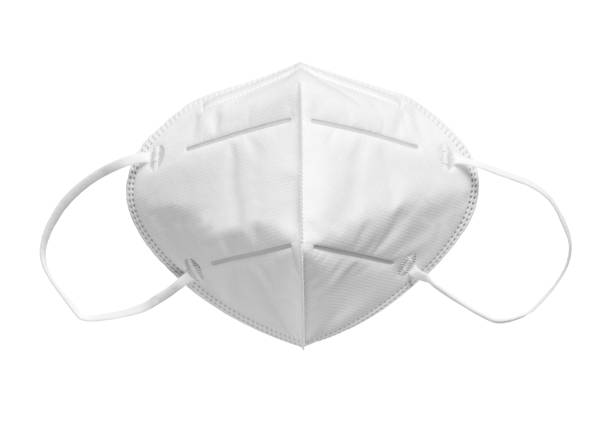 istock White anti-virus mask in white background, close up 1285141110