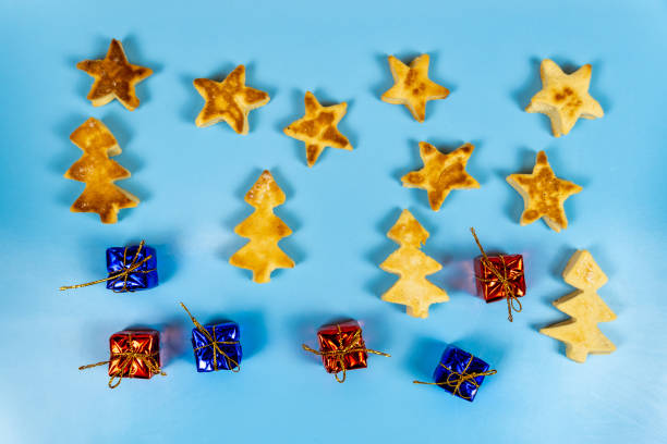 istock Christmas cookies gifts on a blue background. 1285141444
