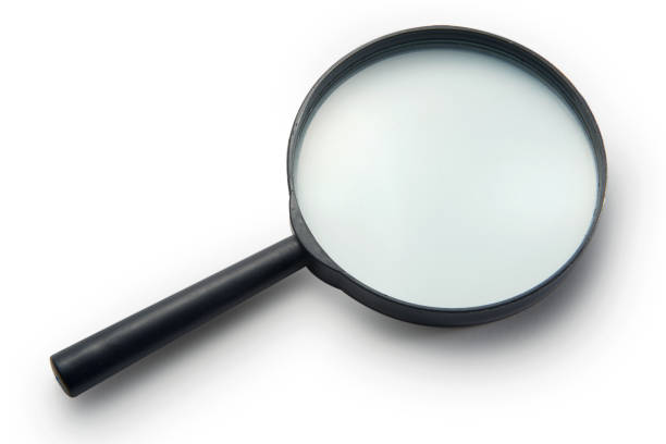 istock close up of magnifying glass, isolated on white 1285145869