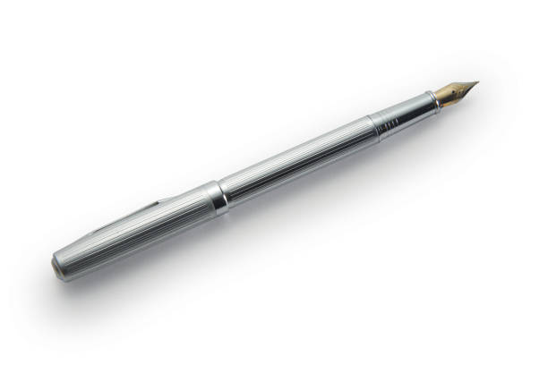 istock Studio shot of a silver fountain pen isolated on white with drop shadow 1285145931