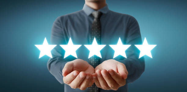 istock Rise on increasing five stars in human hand, Increase rating evaluation and classification concept 1285145958