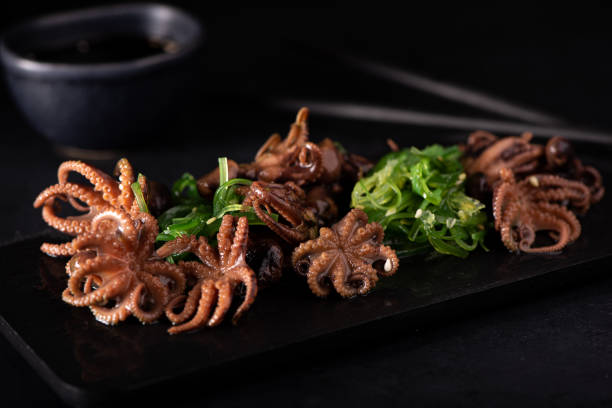 istock small octopus and seaweed salad 1285148424