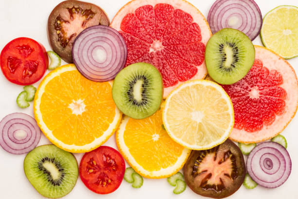 istock Colored abstract still life of fruit slices. 1285148434
