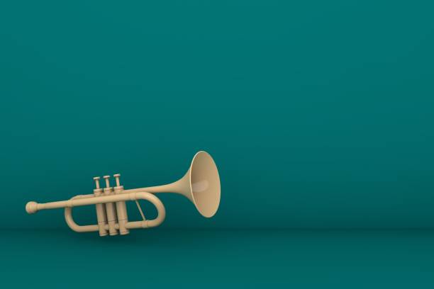 żółta trąbka na zielonym tle - trumpet jazz bugle brass instrument zdjęcia i obrazy z banku zdjęć