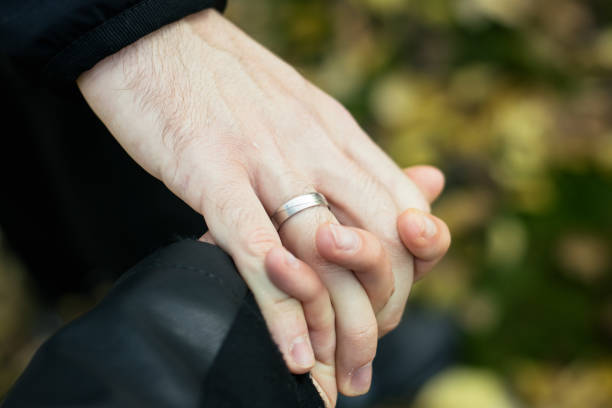 istock Couple holding hands stock photo 1285152121
