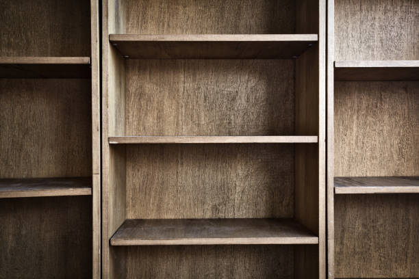 istock Empty wooden book shelf with or storage rack modern retro design, copy space background texture 1285152179
