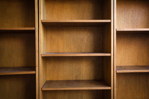 istock Empty wooden book shelf with or storage rack modern retro design, copy space background texture 1285152200