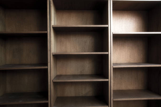 istock Empty wooden book shelf with or storage rack modern retro design, copy space background texture 1285152211