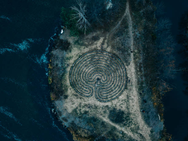 istock Spiral labyrinth made of stones, top view from drone 1285154641