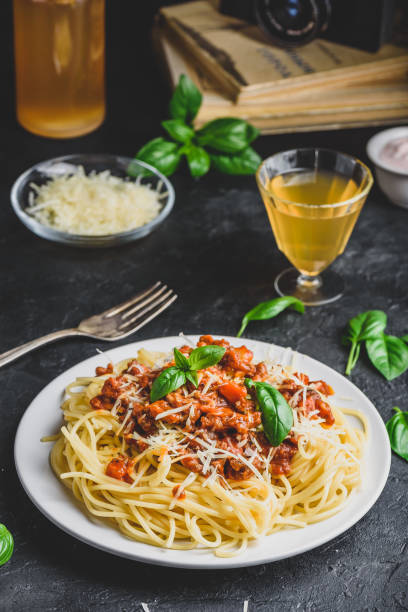 istock Spaghetti with bolognese sauce, parmesan and basil 1285156786