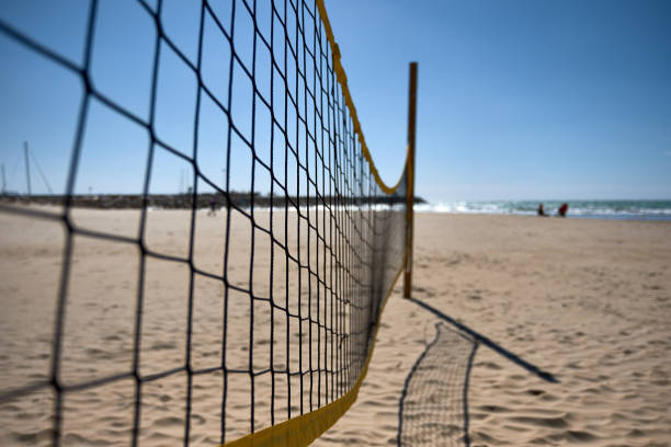 istock volleyball net on the beach without people 1285157448