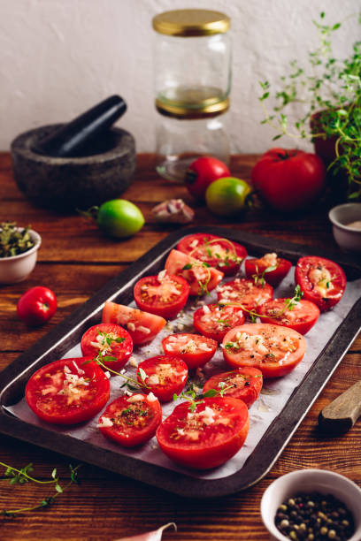 istock Preparation of Tomato Preserves with Thyme and Garlic 1285157628