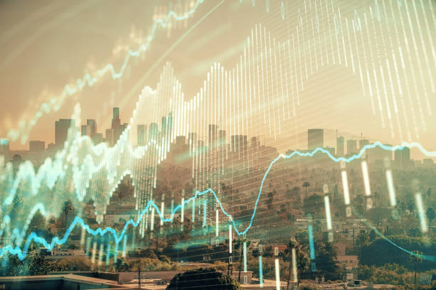 istock Forex chart on cityscape with skyscrapers wallpaper multi exposure. Financial research concept. 1285158047