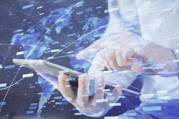 istock Multi exposure of man's hand holding and using a digital device and data theme drawing. Innovation concept. 1285158978