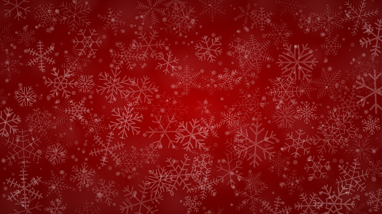 Christmas background of snowflakes of different shapes, sizes and transparency in red colors