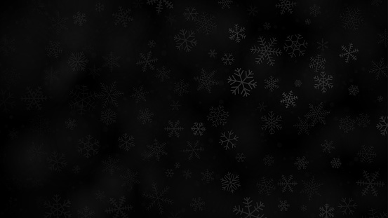 Christmas background of snowflakes of different shapes, sizes and transparency in black and gray colors
