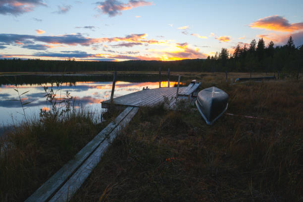 istock Tranquil sunset at a small lake in Sweden 1285160460