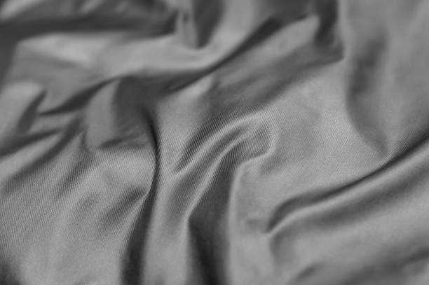 istock Grey fabric texture. Abstract background. Mockup.Texture of gray silk. 1285161522