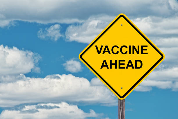 istock Vaccine Ahead Warning Sign 1285162162