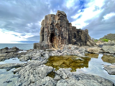 Landscape photo of the spectacular rock formations at popular tourist destination, The Quarry, near Kiama, a town on the south coast of NSW