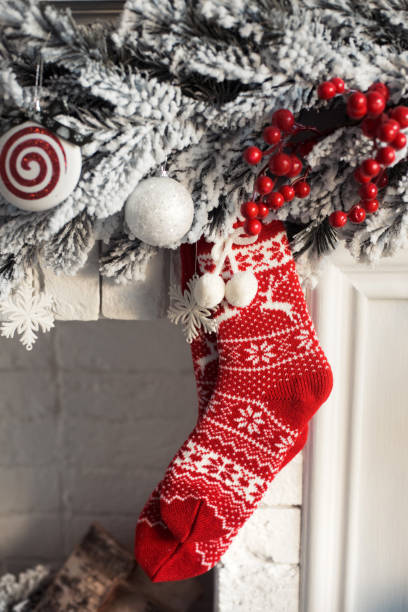 istock Christmas with red socks and snow garland 1285164450