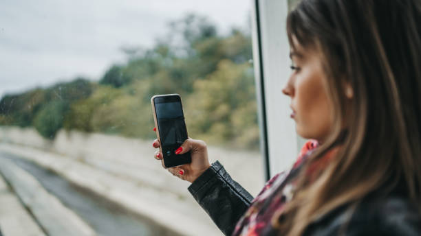 istock Tourist is taking photo from the train window 1285165613