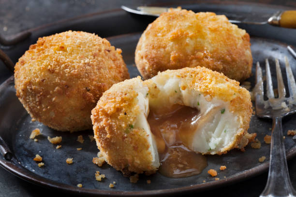 istock Creamy Mashed Potato Croquettes Stuffed with Gravy 1285168715