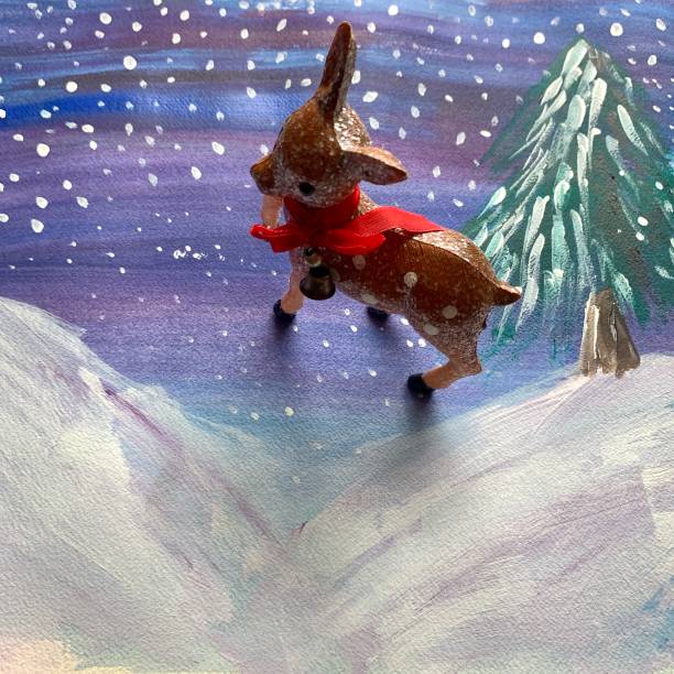 istock Reindeer Decoration on Snow Scene Painted Background 1285170063