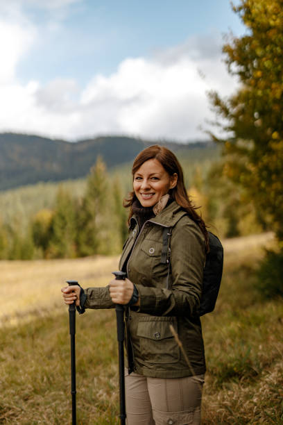 istock Happy woman walking around, camping for weekend. 1285170657