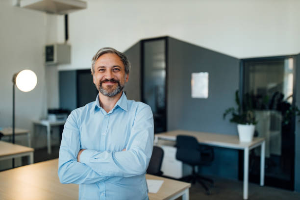 istock Senior businessman in his office. 1285170789