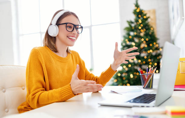 istock Happy employee making video call on Christmas day 1285171795