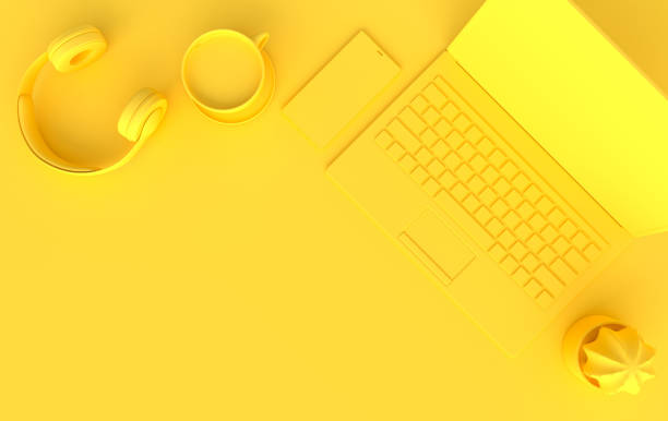 istock Laptop, phone, headphones, cup of coffee 3d rendering. Remote work, freelance, work space, lockdown, stay at home concept. Top view, yellow color 1285174436