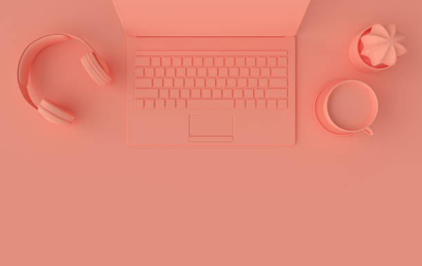 istock Laptop, phone, headphones, cup of coffee 3d rendering. Remote work, freelance, work space, lockdown, stay at home concept. Top view, pink color 1285174437