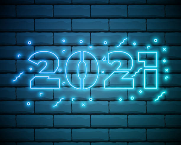 istock Colorful neon 2021 Happy New Year Neon banner. Realistic bright neon billboard on brick wall. Concept of holiday card with glowing text. 2021 Neon Text. Colorful Light Banner. 1285178290