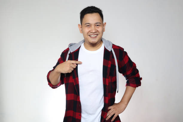 istock Happy Asian Man Smiling and Pointing Himself 1285178297