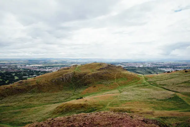 Photo of Silhouettes on the Hillside of Arthur's Seat near Edinburgh, Scotland