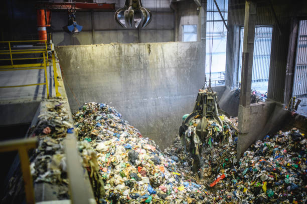 istock Mechanical Grabber in Use Transferring Municipal Waste 1285181676