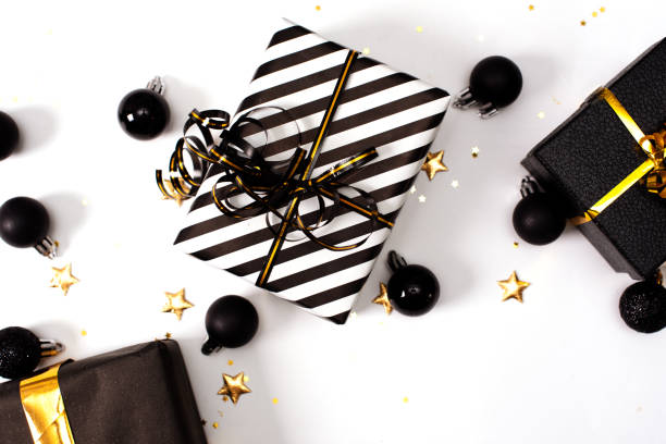 istock Christmas background with decorations and gift boxes on the gray textured board 1285182467