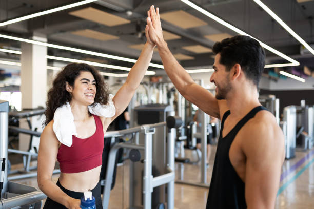 istock Couple doing a high five at the gym 1285189713
