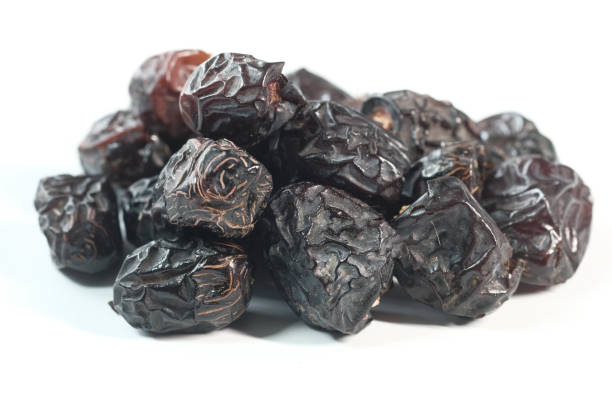 istock close up of fresh date fruit on white background 1285192660