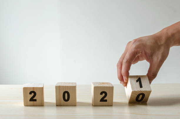 istock Hand flip wooden block 1285194456
