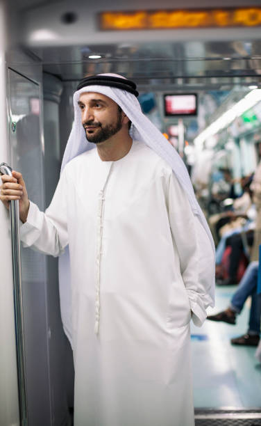istock Sheik riding in subway train in Modern Metro in Dubai 1285195811