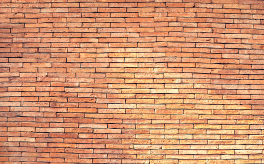 Old brown brick wall texture background